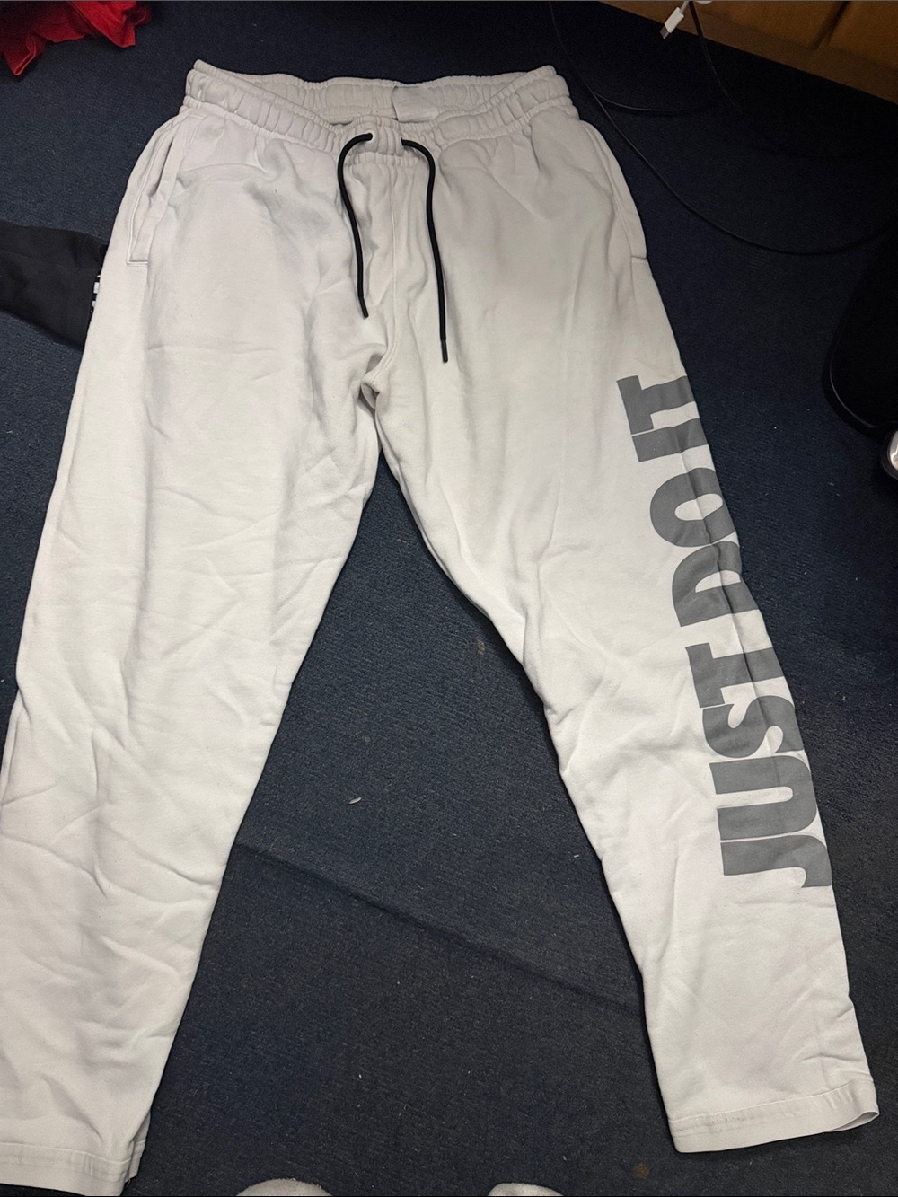 Nike Men's Light Gray Joggers with 'JUST DO IT' Side Logo
